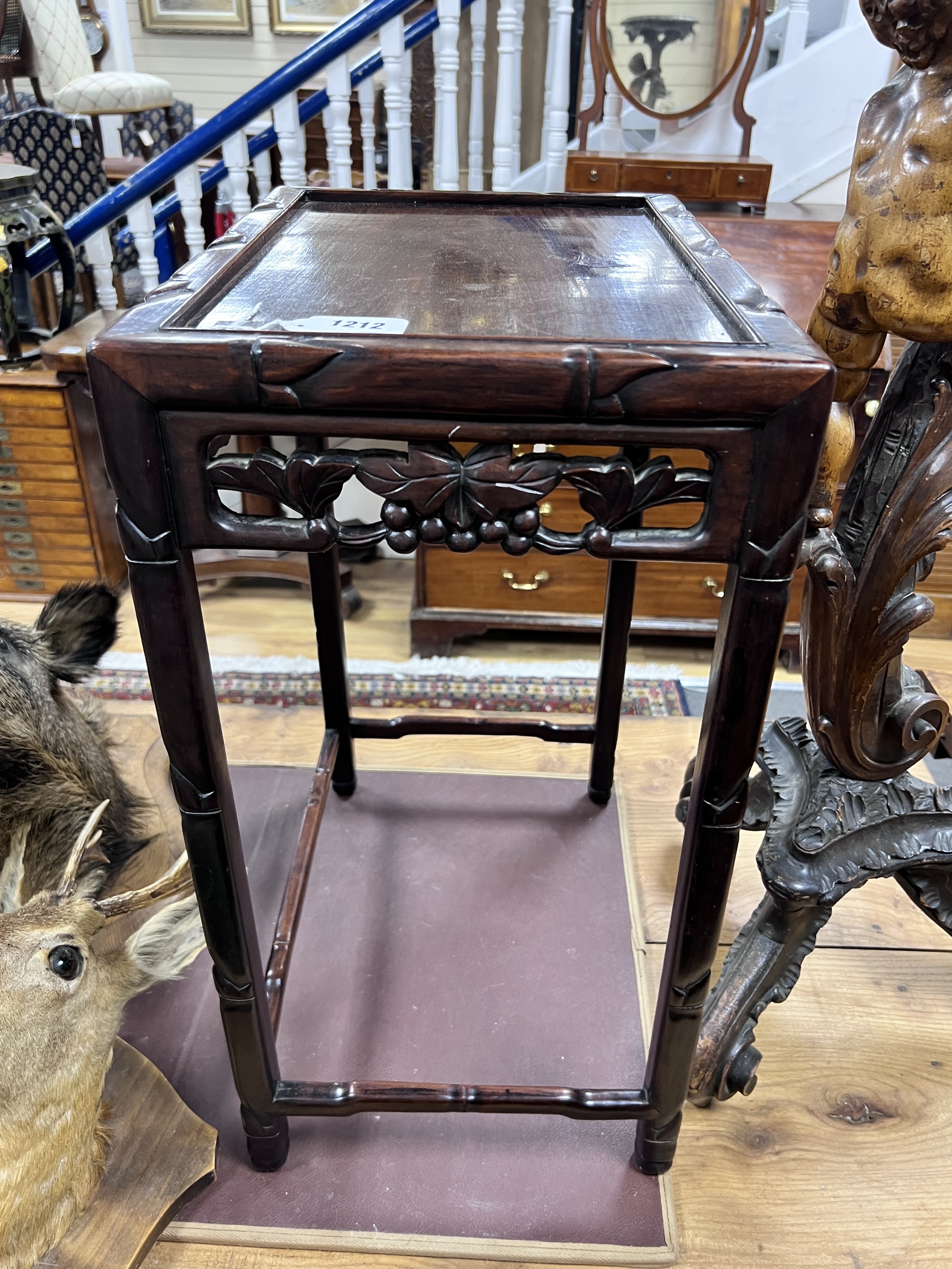 A Chinese hongmu occasional table from a nest, width 43cm